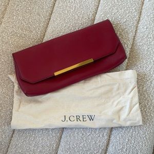 Leather grosgrain clutch with brass bar